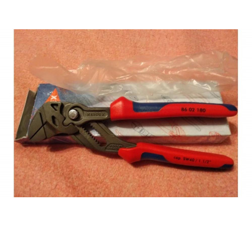 Переставные клещи - гаечный ключ KNIPEX 40 мм, 1 1/2, L-180 мм, серые, 2-к ручки KN-8602180 Переставные клещи - гаечный ключ KNIPEX 40 мм, 1 1/2, L-180 мм, серые, 2-к ручки KN-8602180
