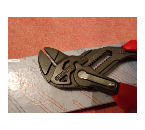 Переставные клещи - гаечный ключ KNIPEX 40 мм, 1 1/2, L-180 мм, серые, 2-к ручки KN-8602180 Переставные клещи - гаечный ключ KNIPEX 40 мм, 1 1/2, L-180 мм, серые, 2-к ручки KN-8602180