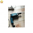 Ударная дрель Makita HP1630